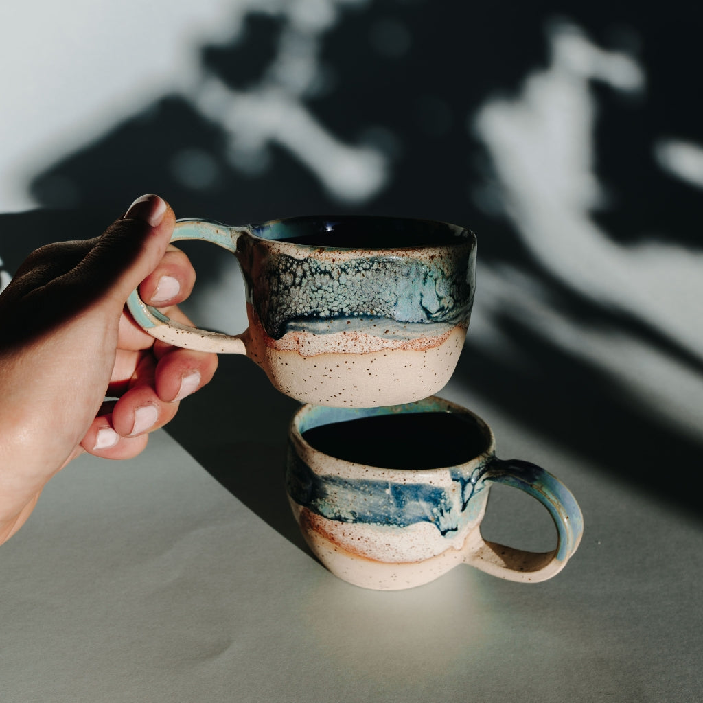 Tidal Breeze Ceramic Cup, made from beige clay with blue glazing, size 250ml