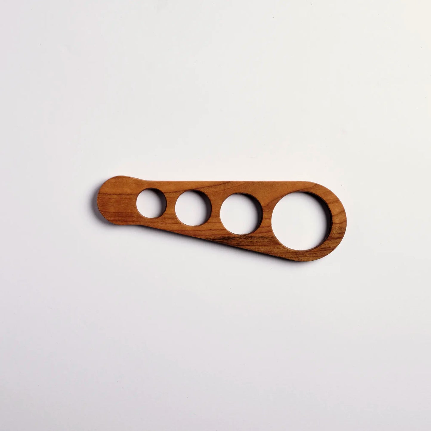 Pasta measurer made from walnut wood