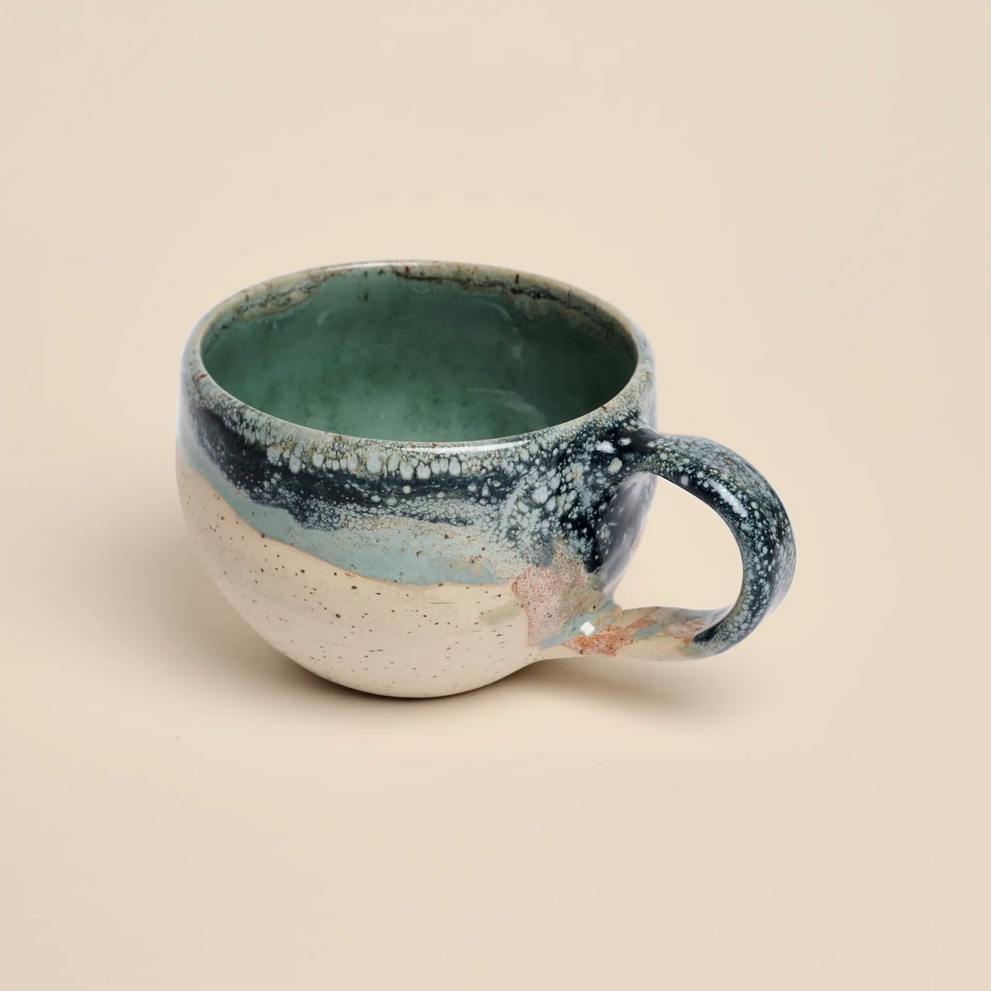 Tidal Breeze Ceramic Cup, made from beige clay with blue glazing, size 250ml