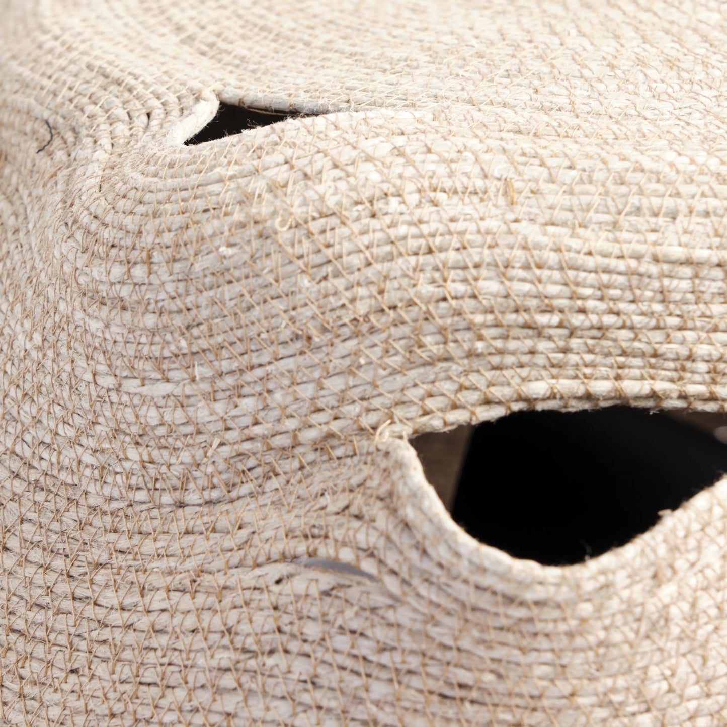 Large chandelier handmade from jute rope. It is the natural colour of jute. The image is a detail.