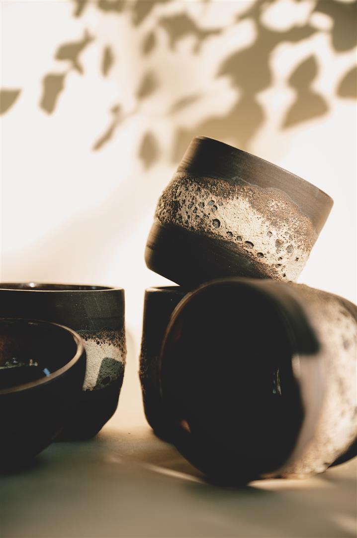 Enchanted Glade coffee cup made from black clay with magma glaze, size 150ml.