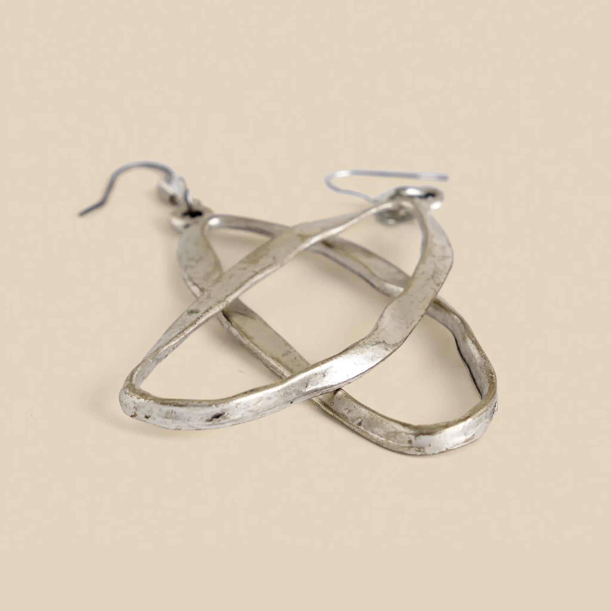 Lunar Lux Earrings are handmade from surgical steel, have a very special oval shape