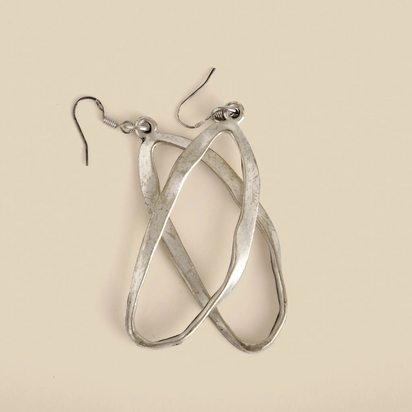 Lunar Lux Earrings are handmade from surgical steel, have a very special oval shape