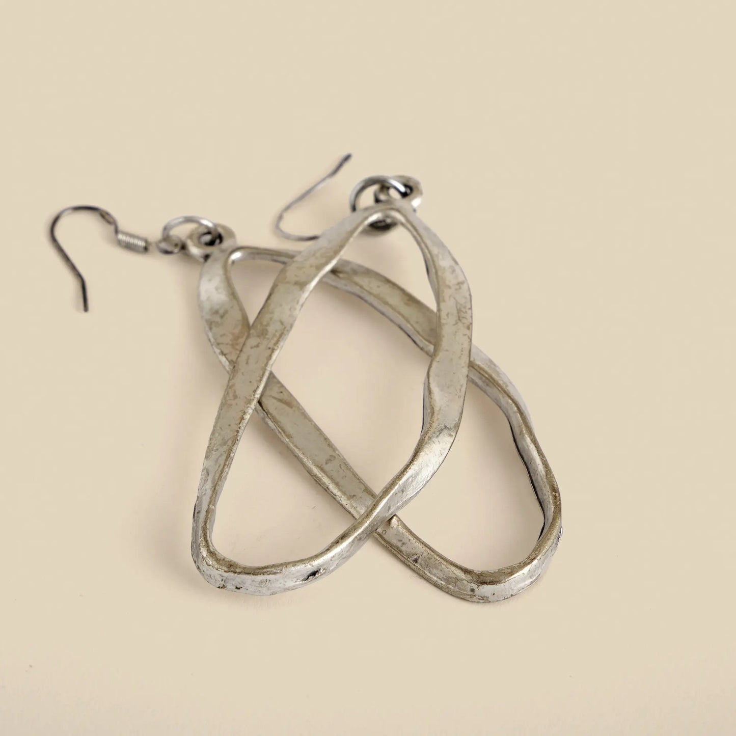 Lunar Lux Earrings are handmade from surgical steel, have a very special oval shape