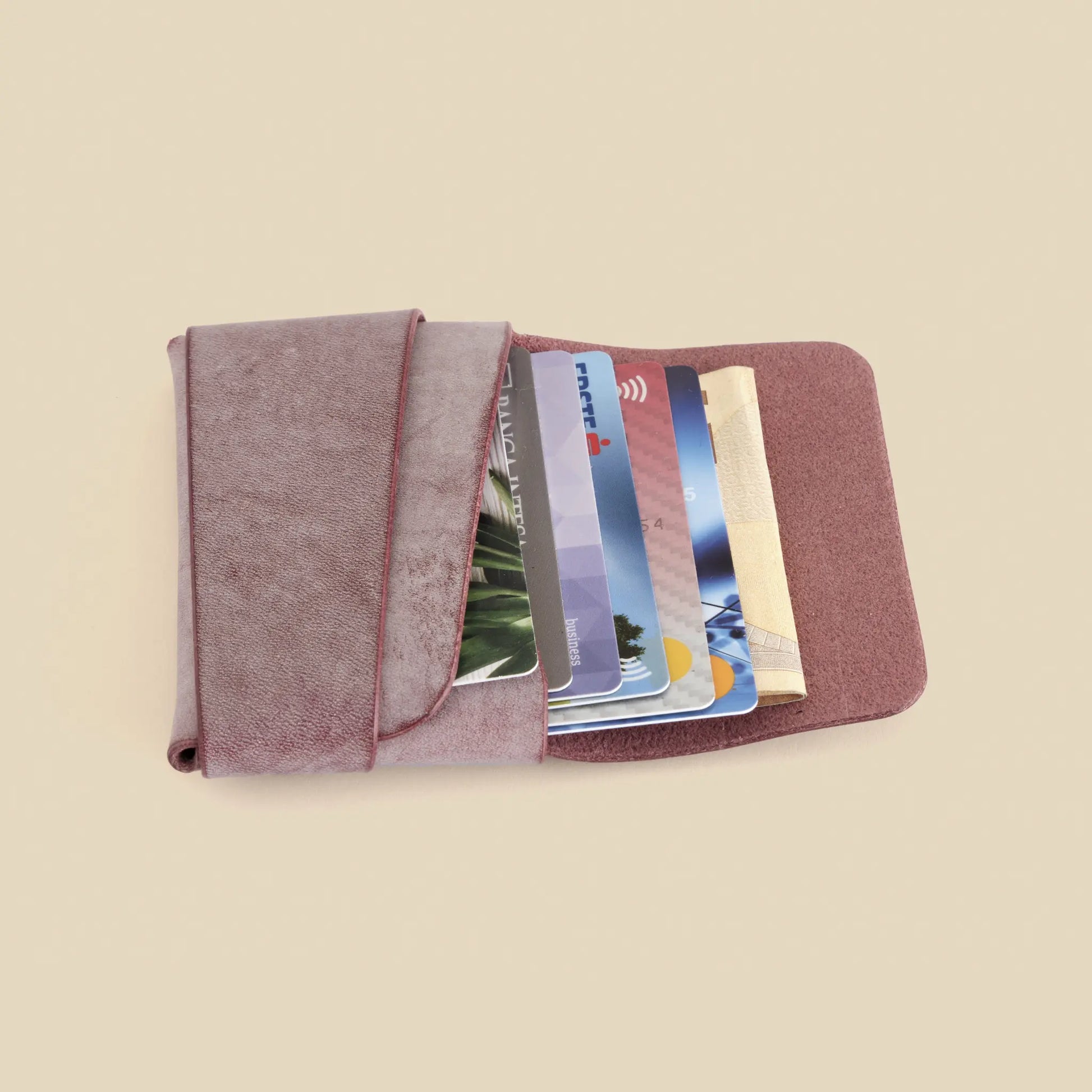 Sleek Stash Cardholder is handmade from genuine, ethically sourced leather.