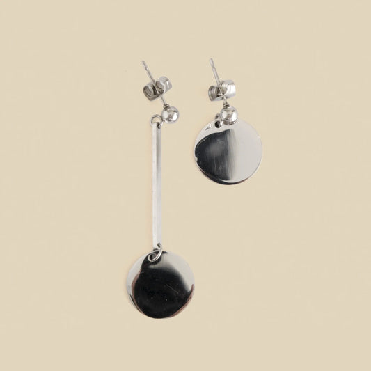 Twilight Twists Earrings are handmade from surgical steel, asymmetrical.