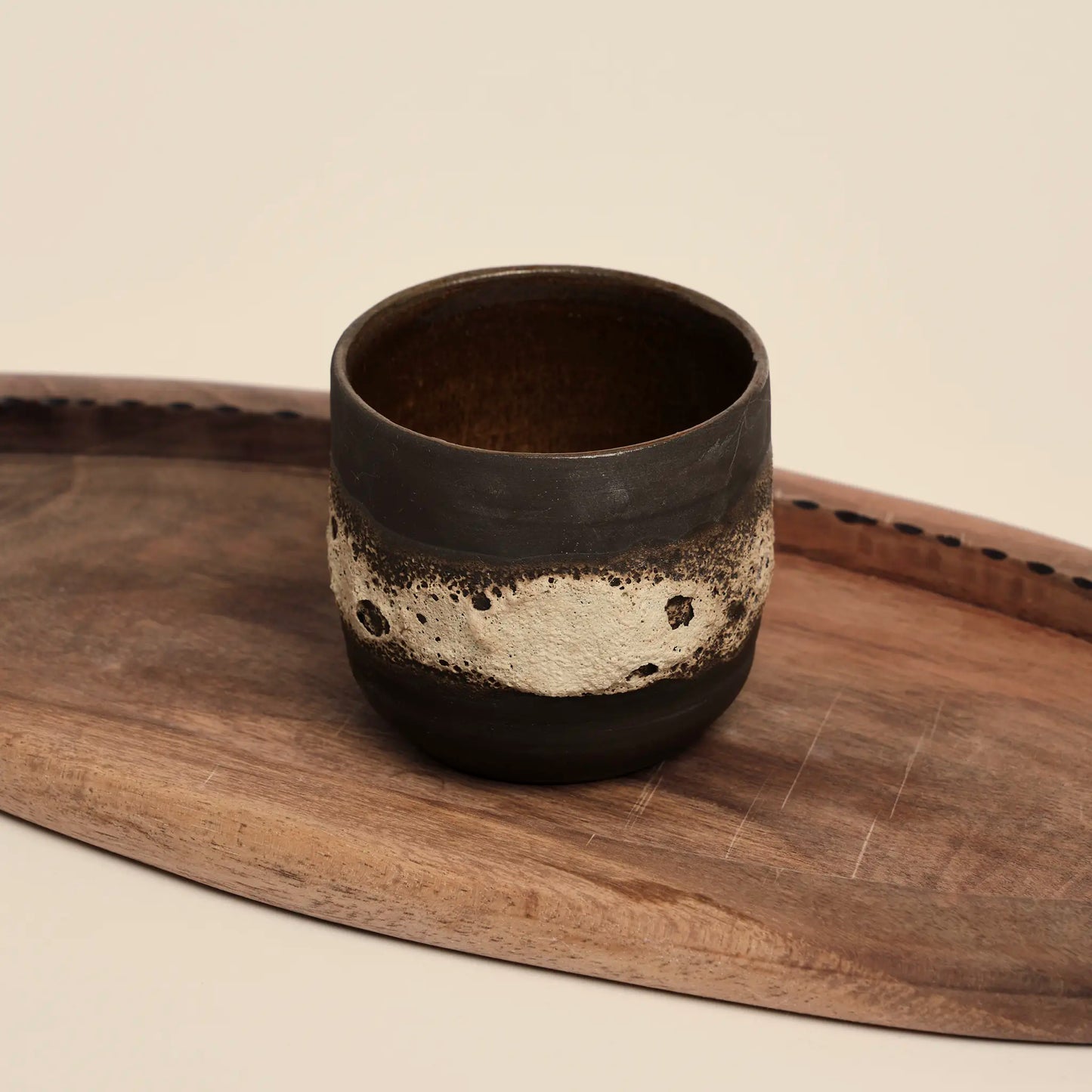 Enchanted Glade coffee cup made from black clay with magma glaze, size 150ml.