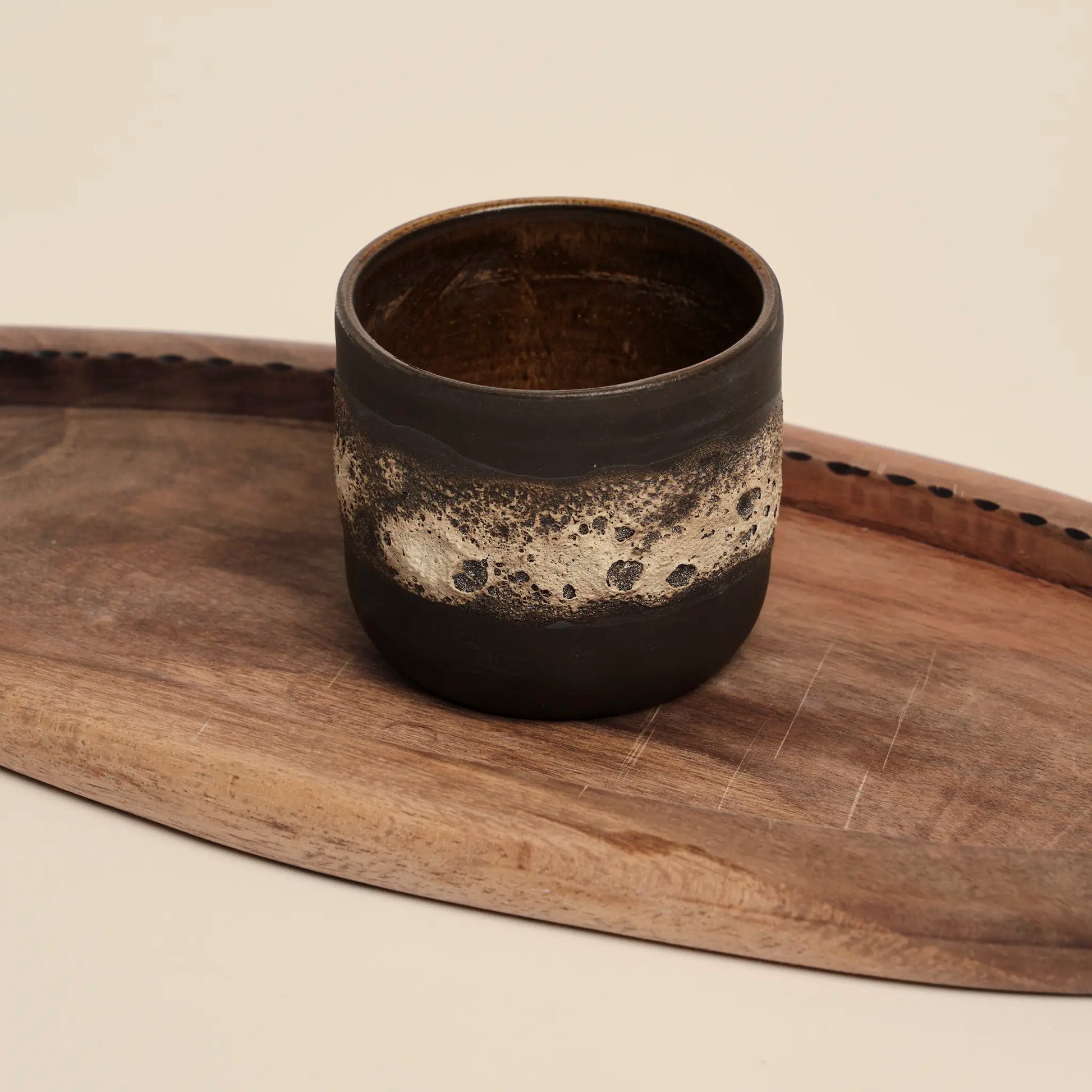 Enchanted Glade coffee cup made from black clay with magma glaze, size 150ml.