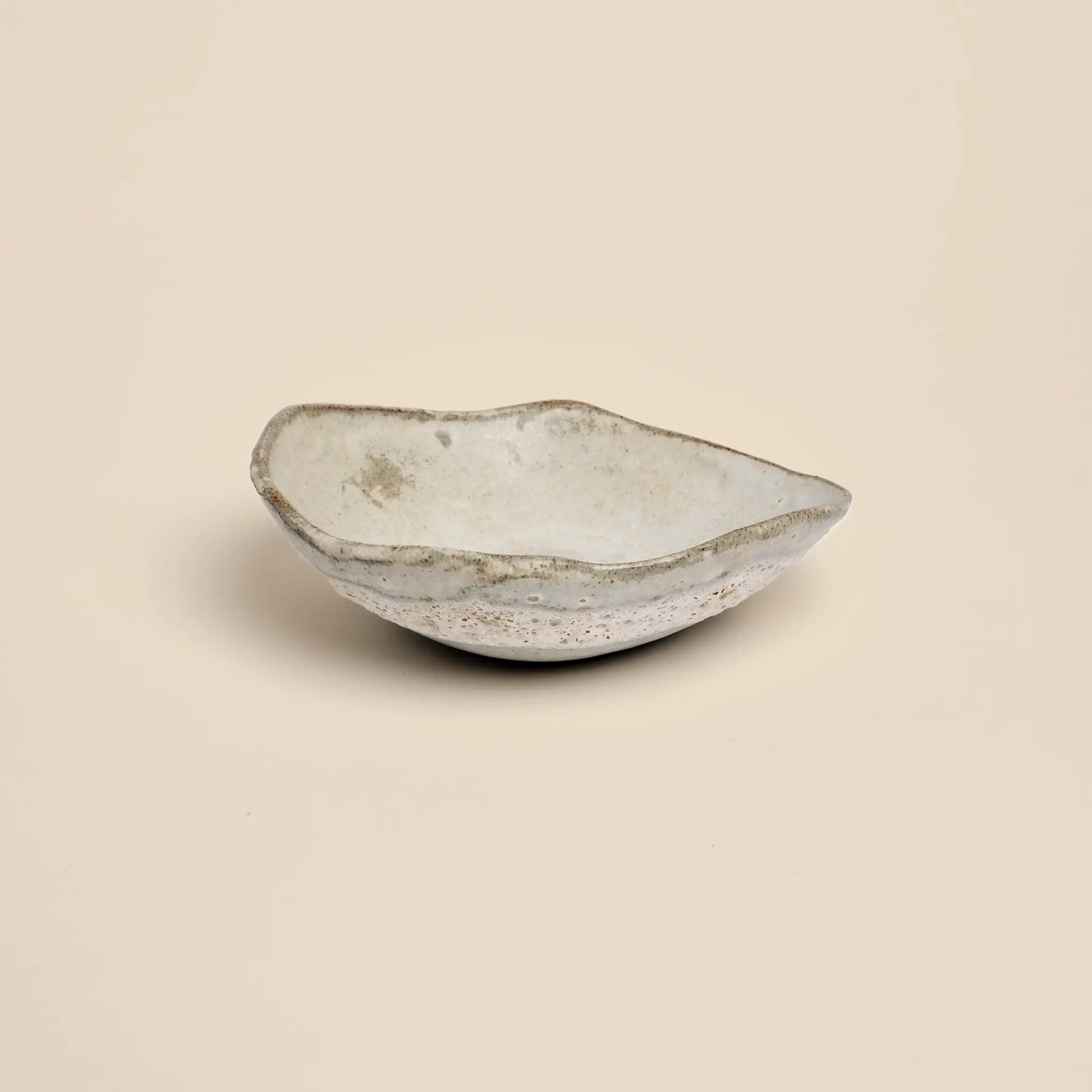 Small ceramics bowl handmade from grey clay