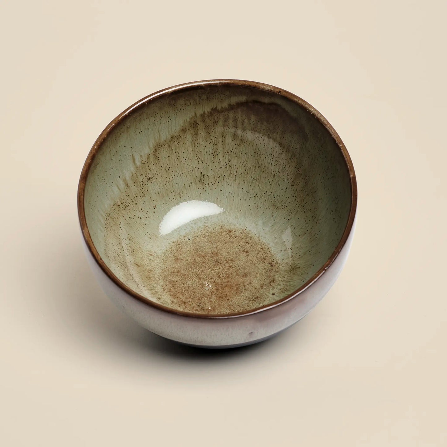 Moss&Shadow ceramics bowl is a black and green bowl handmade from black clay. Perfect for dining experience.
