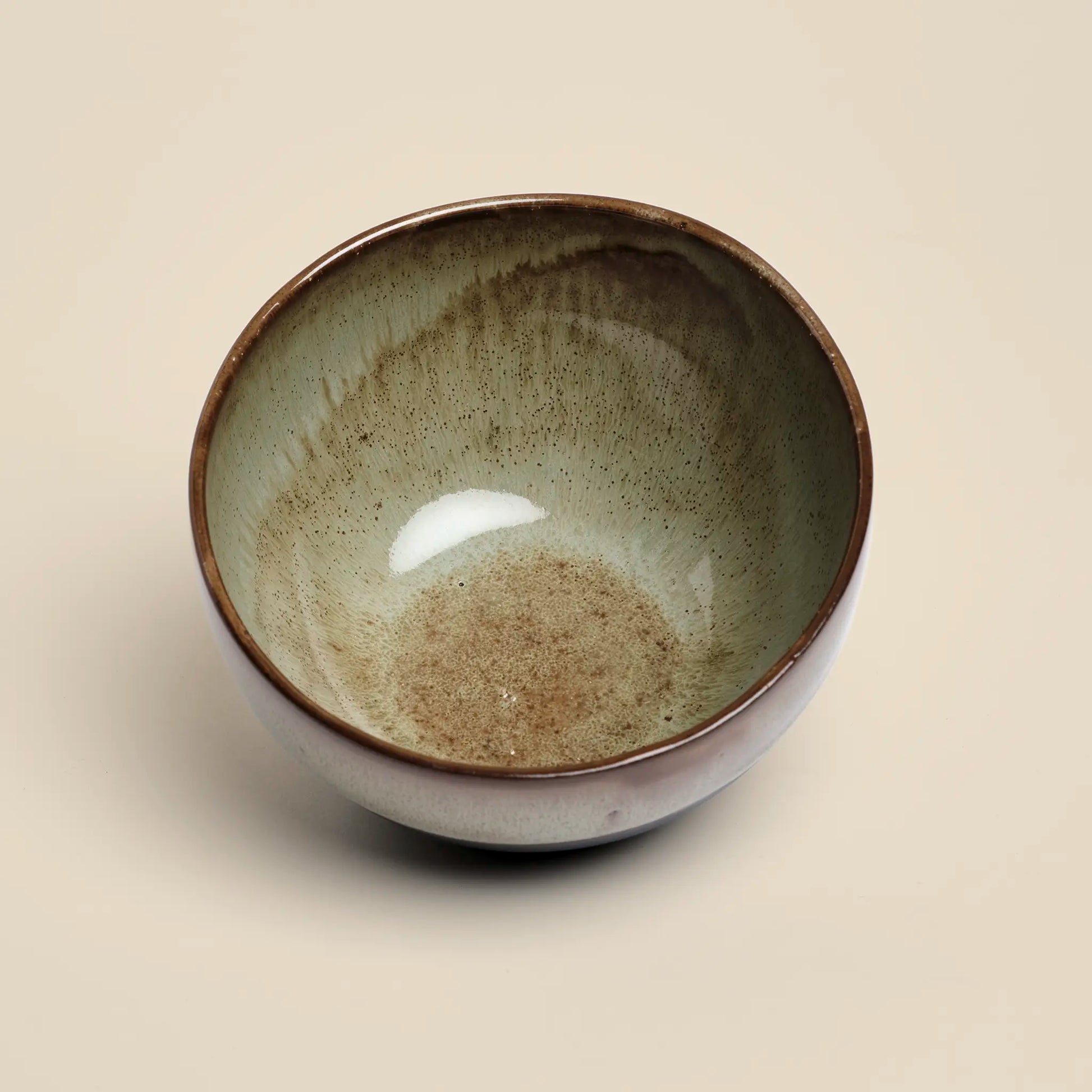 Moss&Shadow ceramics bowl is a black and green bowl handmade from black clay. Perfect for dining experience.