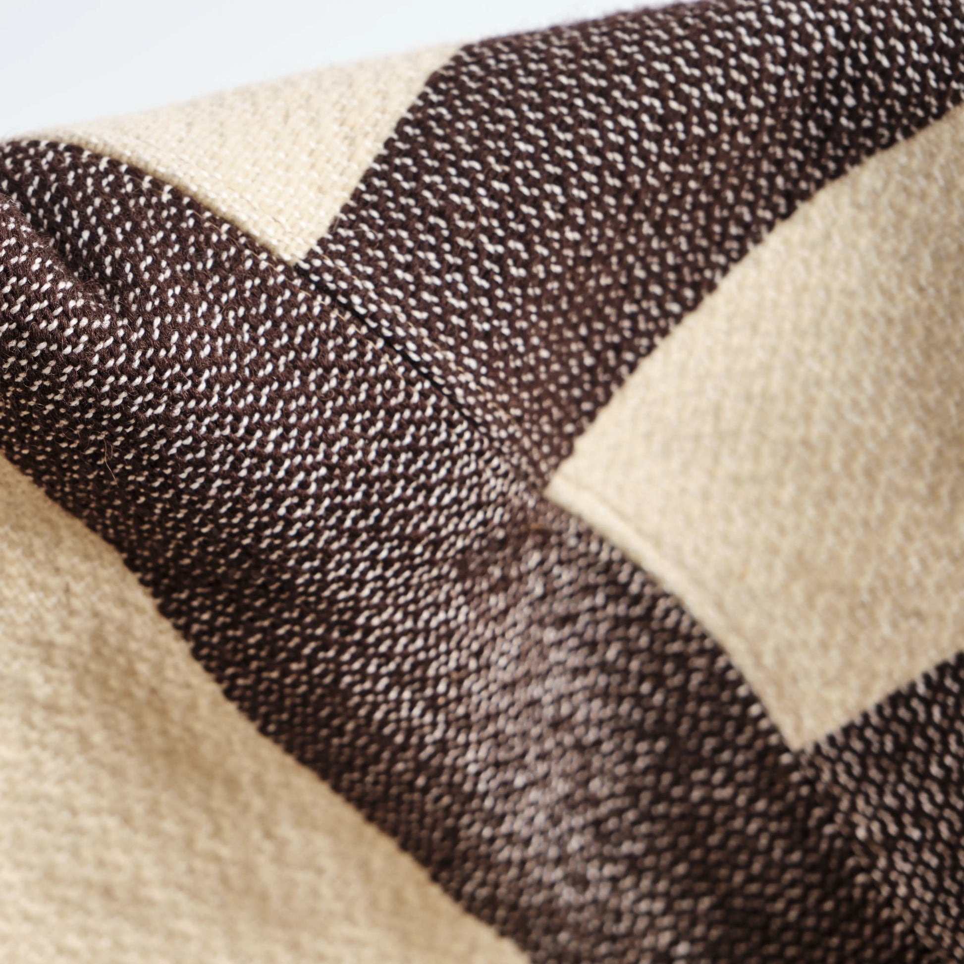 Homeware basket handmade from wool and cotton. The image is a detail of the basket. 