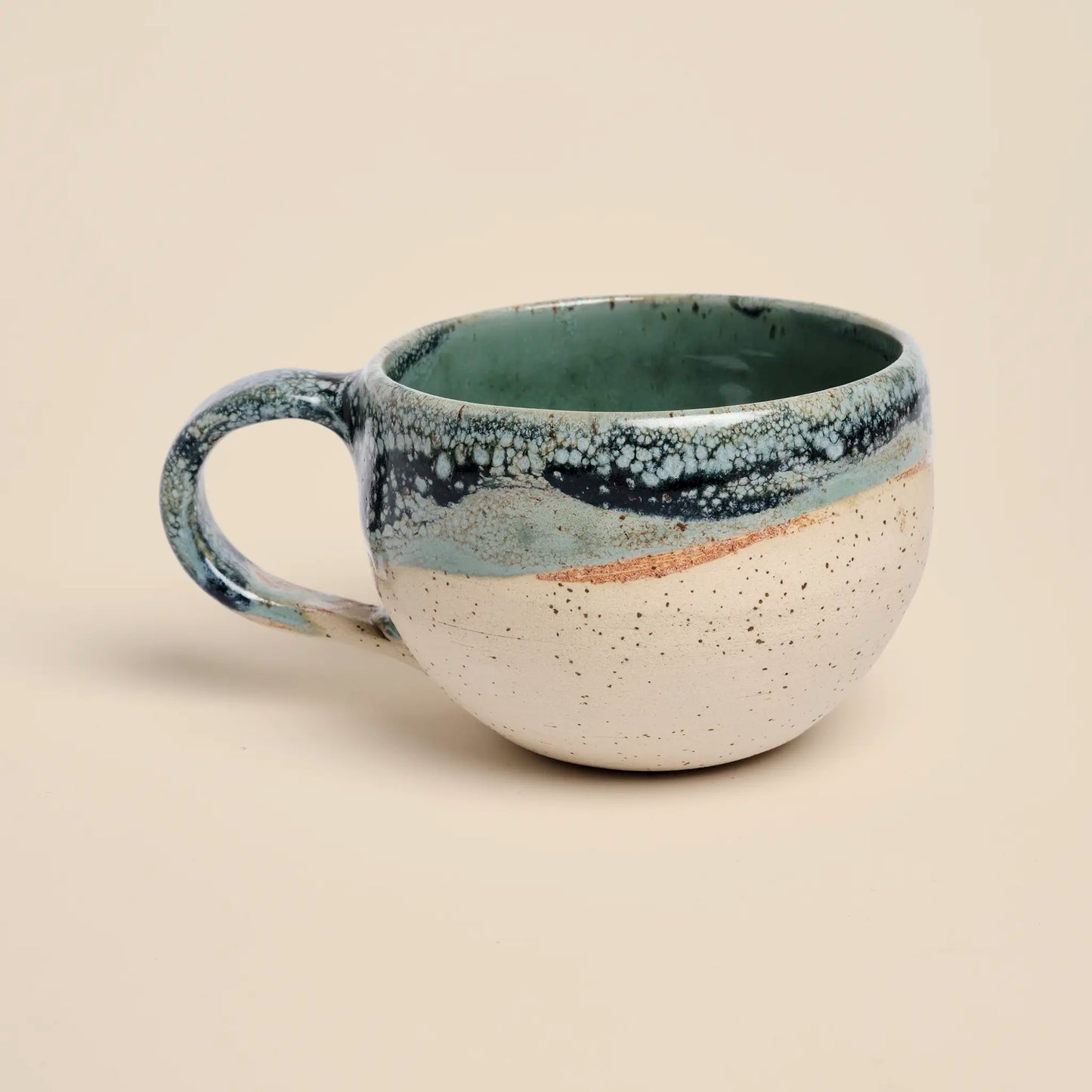 Tidal Breeze Ceramic Cup, made from beige clay with blue glazing, size 250ml