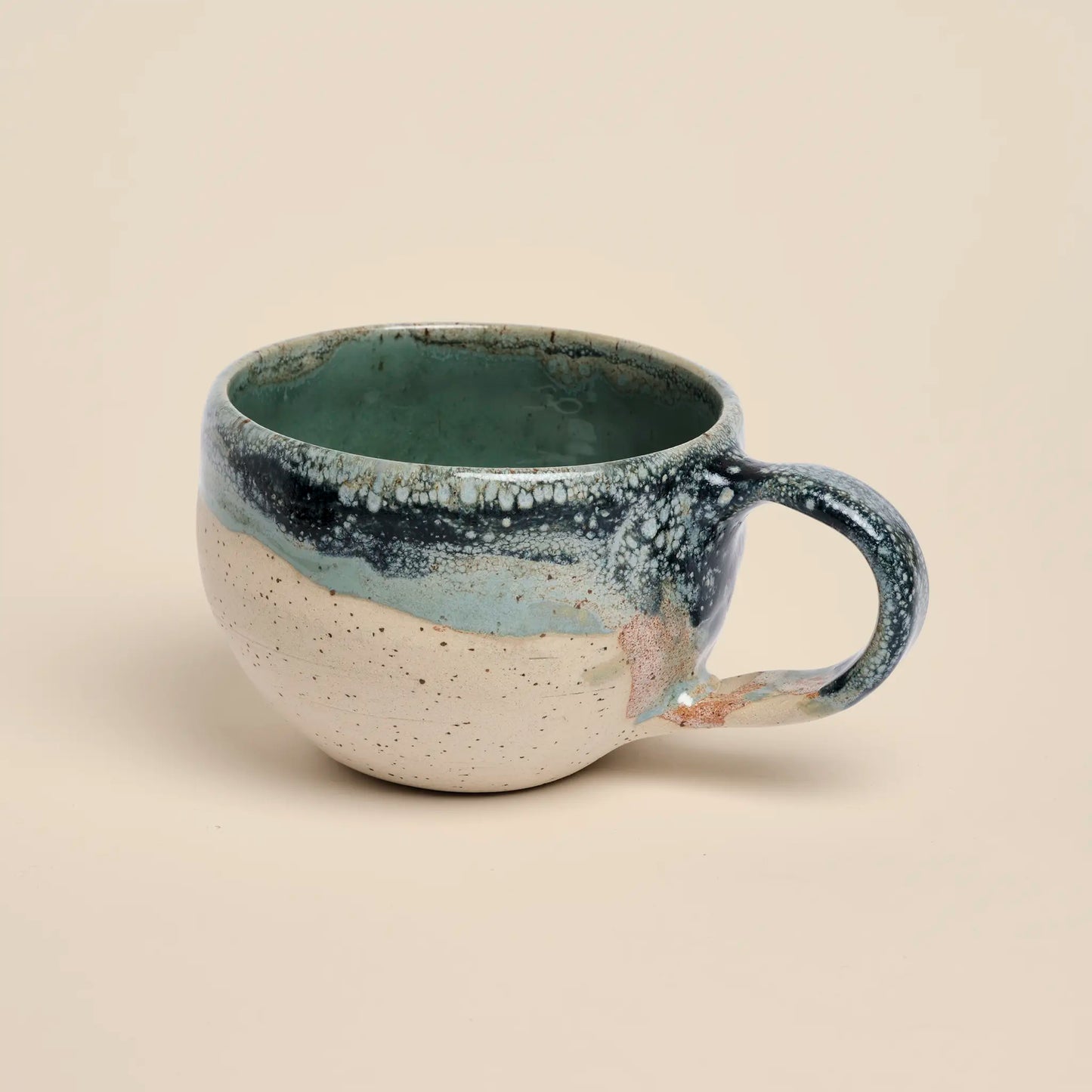 Tidal Breeze Ceramic Cup, made from beige clay with blue glazing, size 250ml