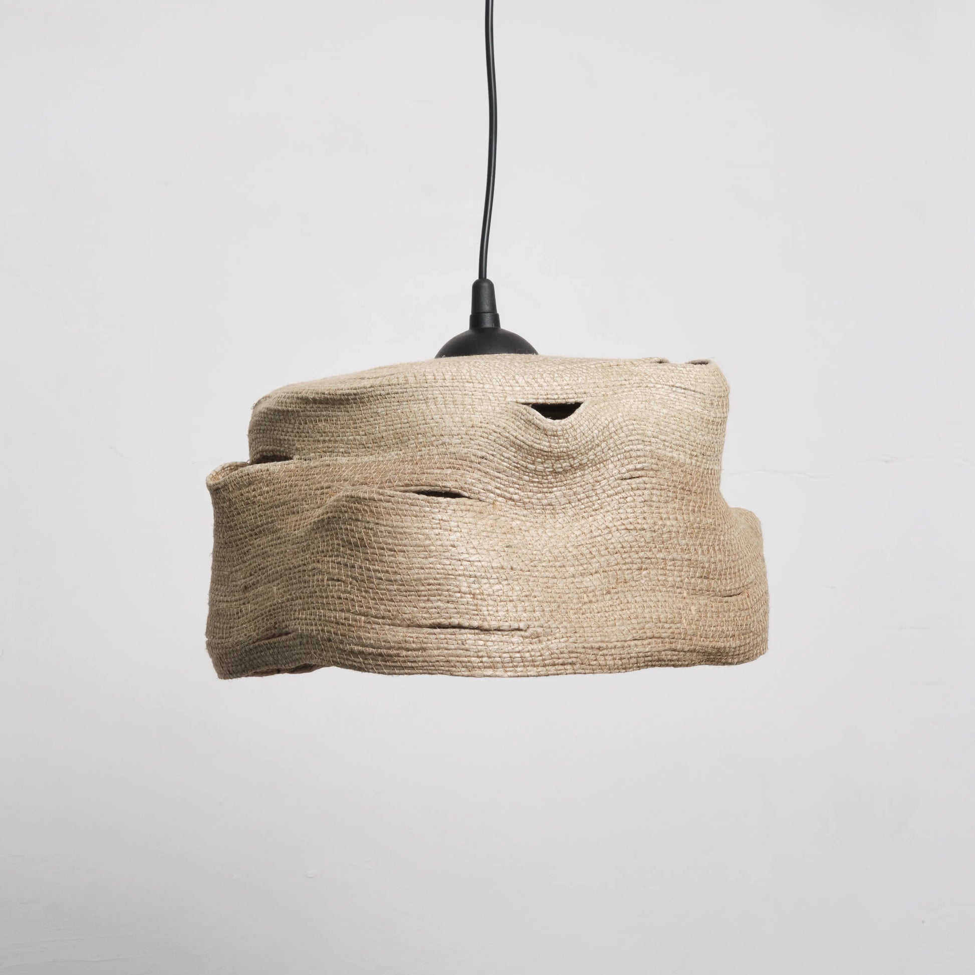 Large chandelier handmade from jute rope. It is the natural colour of jute.  